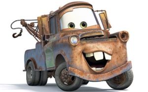 This is the character "Mater" of the Disney movies "Cars" and its sequel. 